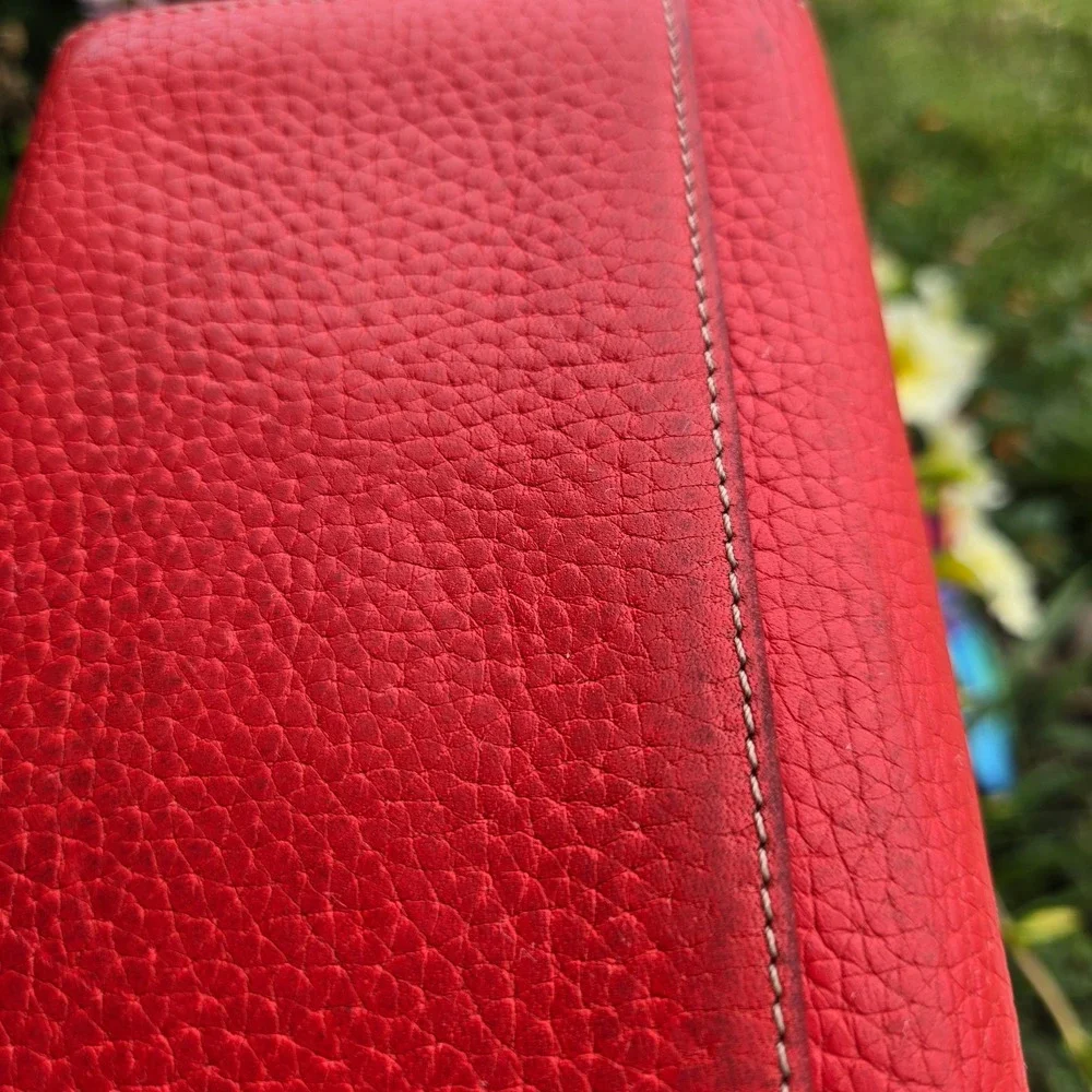 kate spade bifold pebble leather wallet. In red. Flaws